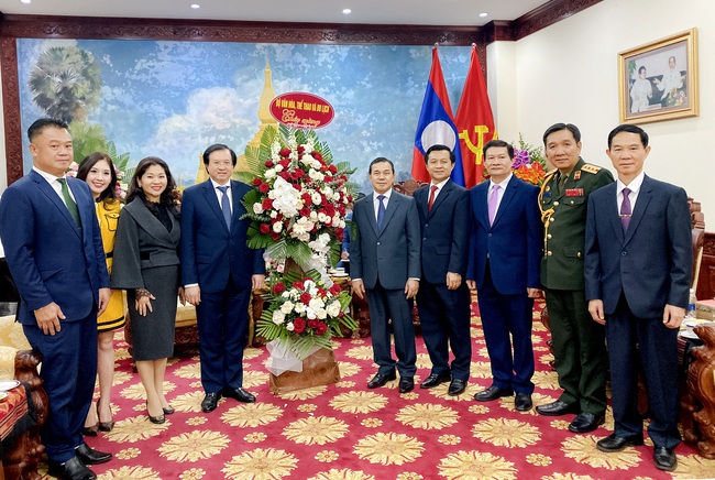 Thứ trưởng Bộ Văn hóa, Thể thao và Du lịch Tạ Quang Đông chúc mừng Quốc khánh CHDCND Lào - Ảnh 2.