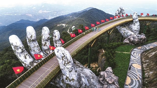 Việt Nam mở cửa lại du lịch hút sự quan tâm của truyền thông quốc tế - Ảnh 1.