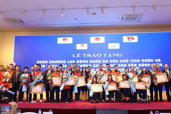 Vinh danh thành tích xuất sắc các HLV, VĐV thể thao người khuyết tật - Ảnh 4.
