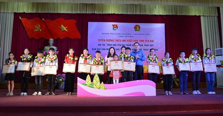 Hội thi thiếu nhi Yên Bái tham gia giữ gìn, phát huy bản sắc văn hóa các dân tộc và tìm hiểu Nghệ thuật Xòe Thái”; Liên hoan thiếu nhi vượt khó tỉnh Yên Bái năm 2024 - Ảnh 1.