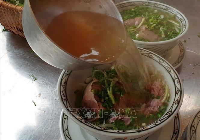 Hành trình chinh phục vị giác của du khách trải nghiệm ẩm thực Hà Nội - Ảnh 2.