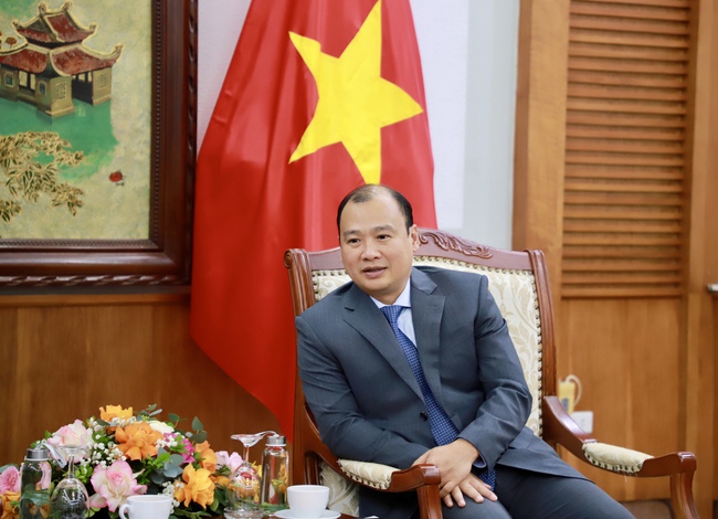 Thứ trưởng Thường trực Lê Hải Bình tiếp Phó Trưởng ban Tuyên huấn Trung ương Đảng Nhân dân Cách mạng Lào - Ảnh 4.
